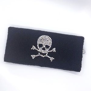 Betsy Johnson skull and crossbones clutch